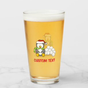 Christmas penguin sitting with snow balls glass