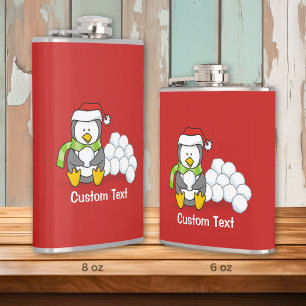 Christmas penguin sitting with snow balls hip flask