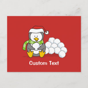 Christmas penguin sitting with snow balls holiday postcard