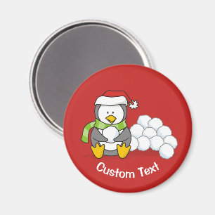 Christmas penguin sitting with snow balls magnet