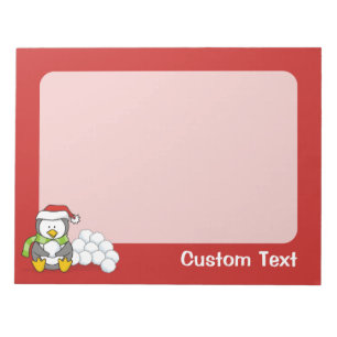 Christmas penguin sitting with snow balls notepad