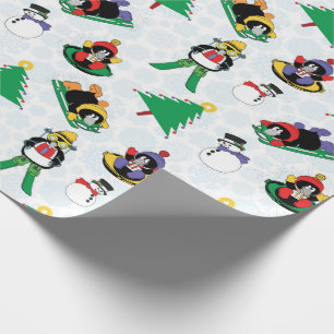 Christmas penguin skiing wrapping paper