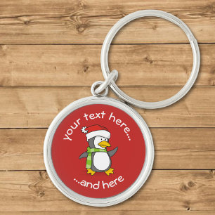 Christmas penguin walking on snow key ring