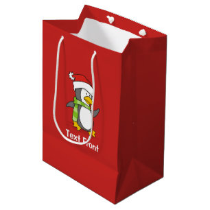 Christmas penguin walking on snow medium gift bag