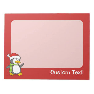 Christmas penguin walking on snow notepad