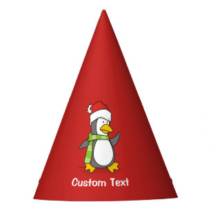 Christmas penguin walking on snow party hat