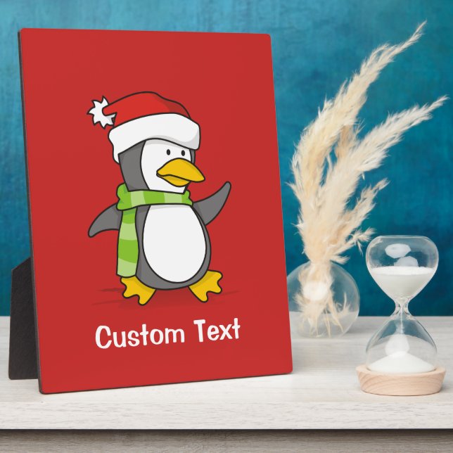 Christmas penguin walking on snow plaque (Side)