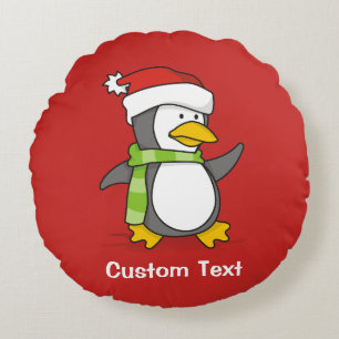 Christmas penguin walking on snow round cushion