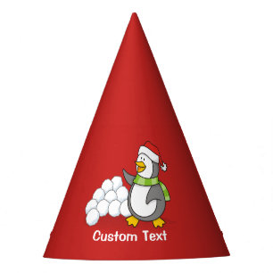Christmas penguin with snow balls waving party hat