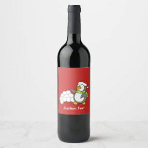 Christmas penguin with snow balls waving wine label