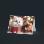 Christmas Persian Kitten In a Gift Box Holiday Card<br><div class="desc">A fluffy white Persian kitten with big blue eyes peeks from a red and gold gift box on a fur rug.
Text can be changed.</div>