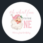 Christmas Pink Santa First Birthday Classic Round Sticker<br><div class="desc">Oh what fun,  it is to be One! Christmas Pink Santa first birthday party stickers with watercolor pink santa.</div>