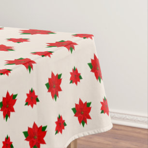 Christmas Poinsettia Flowers on Light Beige Tablecloth