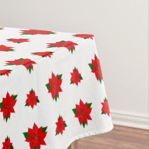 Christmas Poinsettia Flowers on White Tablecloth