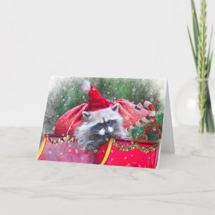 Christmas Raccoon lounging in Santa's Sleigh Holiday Card