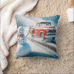 Christmas Red Retro Truck With Snowman Cushion<br><div class="desc">A cheerful snowman stands beside a road as a vintage red truck drives by in a snowy landscape</div>