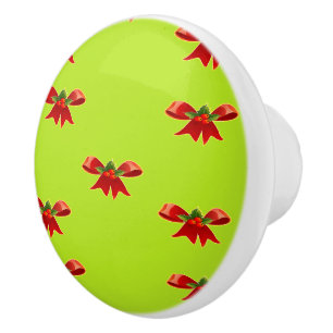 Christmas red ribbon on bright green ceramic knob