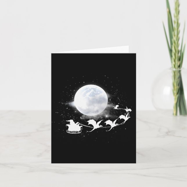 Christmas Santa Claus Flying Past The Moon Dragon  Card (Front)