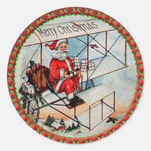 Christmas Santa flying a old aeroplane Classic Round Sticker