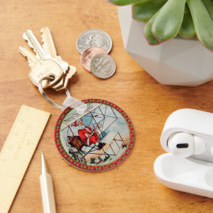 Christmas Santa flying a old aeroplane Key Ring