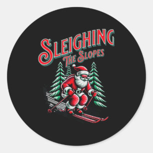 Christmas skiing santa skiing sleighing the slopes classic round sticker