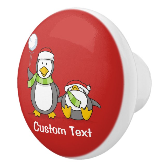 Christmas Snowballing penguins Ceramic Knob (Right)
