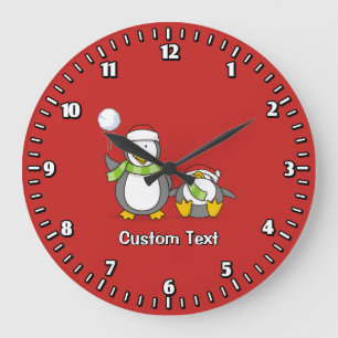 Christmas Snowballing penguins Large Clock