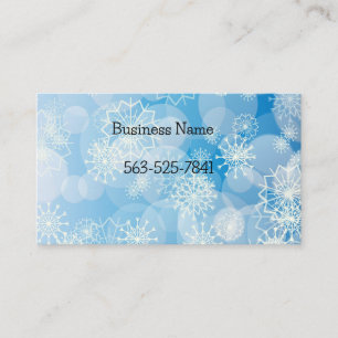 Christmas snowflakes on a blue background business card