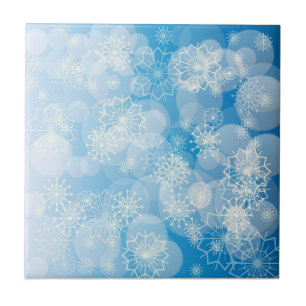 Christmas snowflakes on a blue background ceramic tile