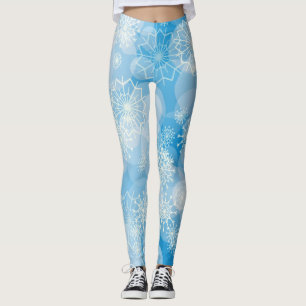 Christmas snowflakes on a blue background      leggings