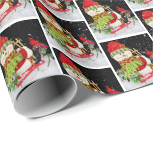 Christmas snowman on a sled wrapping paper