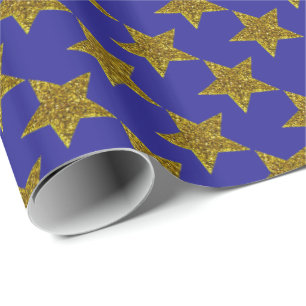 Christmas sparkly stars on blue wrapping paper