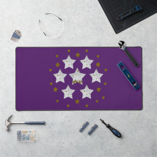 Christmas stars on purple desk mat