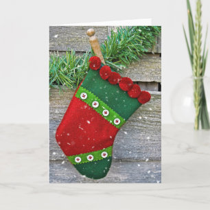 Christmas stocking in snowflakes holiday card