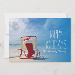 Christmas stocking on a beach chair holiday card