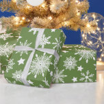 Christmas Theme Green White Snowflakes Pattern Wrapping Paper<br><div class="desc">This classic Christmas theme design features beautiful white snowflakes on a Christmas green background and is perfect for wrapping your presents during the holiday season.</div>
