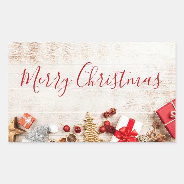 Christmas Themed Items on a Rustic Wooden Board Rectangular Sticker (Front)
