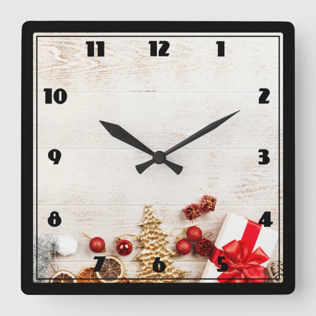 Christmas Themed Items on a Rustic Wooden Board Square Wall Clock (Front)