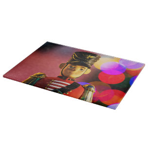 Christmas toy soldier figurine SlipperyJoe gay pri Cutting Board