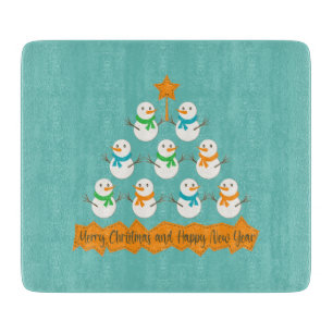 Christmas tree pyramid made of xmas snowmen cutting board