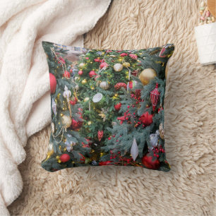 Christmas tree with golden, red toys. cushion