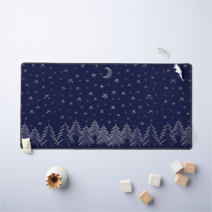 Christmas trees and stars in blue desk mat