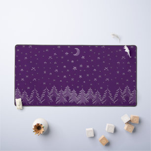 Christmas trees and stars in purple desk mat