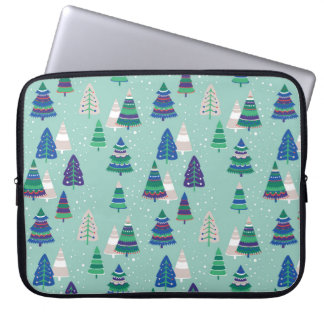 Christmas trees on a blue background laptop sleeve