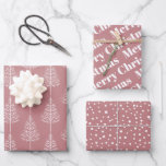 Christmas trees, polka dots dusty rose holiday wrapping paper sheet<br><div class="desc">Merry Christmas,  trees and polka dots dusty rose pink holiday Wrapping Paper Sheets. The first sheet features white winter trees on dusty rose background. The second showcases the text :"Merry Christmas" in bold typogtaphy and the third displays polka dots-snow.</div>