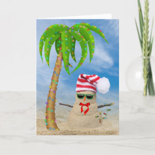 Christmas tropical sand man with palm tree holiday card