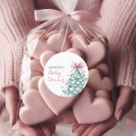 Christmas Winter Girl Baby Shower Classic Round Sticker<br><div class="desc">Celebrate the arrival of your little girl with this charming winter-themed baby shower Round Sticker. Featuring a teal Christmas tree adorned with a delicate blush pink bow and surrounded by pastel snowflakes, this elegant design blends festive charm with a soft, coquette touch. Perfect for creating a memorable winter baby shower...</div>