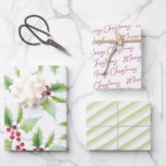 Christmas Wrapping Paper Watercolor Red and Green<br><div class="desc">This Christmas wrapping paper features botanical red berries and greenery, green and white stripes and "Merry Christmas" pattern. Each sheet is a trendy yet cute choice for your Christmas gift giving needs. To see more designs like this visit www.zazzle.com/dotellabelle Unique watercolor art and design by Victoria Grigaliunas of Do Tell...</div>