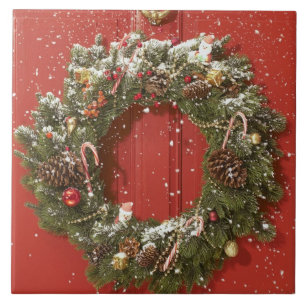 Christmas wreath hanging on a door ceramic tile