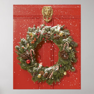 Christmas wreath hanging on a door poster